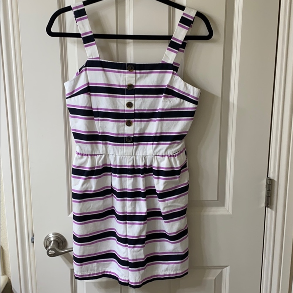Super cute black and purple striped romper!